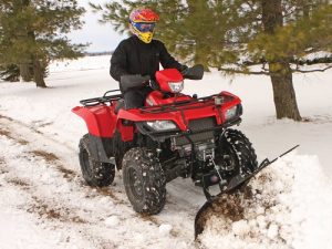 Pushing Some Snow With An ATV